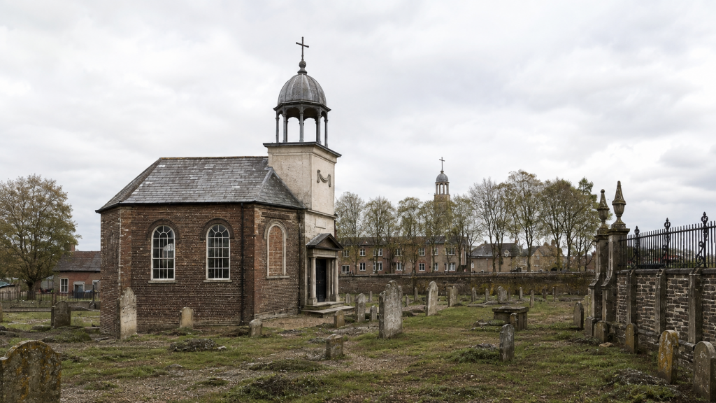  An AI reconstruction of the burial-ground chapel in St Margaret’s New Burial Ground (what was to become StJames Park), King’s Lynn, around 1810, based on an original image published in William Richards’s History of Lynn in 1812.