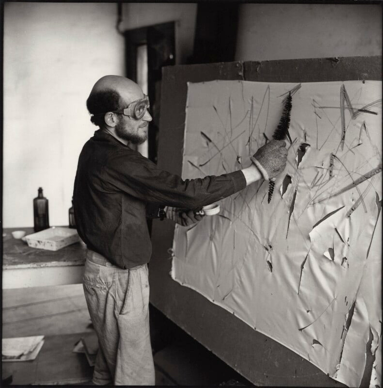 Gustav Metzger practising auto-destructive art with acid on nylon, National Portrait Gallery.