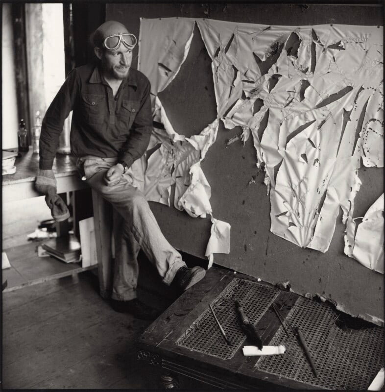 Gustav Metzger practising auto-destructive art with acid on nylon, National Portrait Gallery.