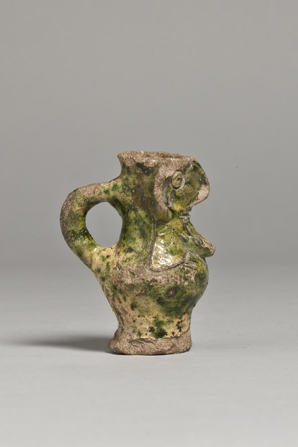 A fourteenth-century fragment of Grimston ware decorated with a bearded human face. The pottery industry centred on Grimston and Pott Row supplied medieval markets in England and across the North Sea.
Photograph: C B PY-SA 2.0, the Portable Antiquities Scheme/The Trustees of the British Museum.